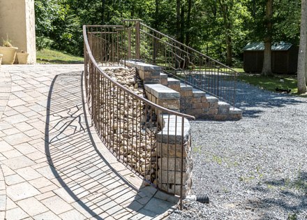 Artist-blacksmith entrance railing, view of right ramp