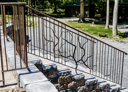 Artist-blacksmith entrance railing - stair view